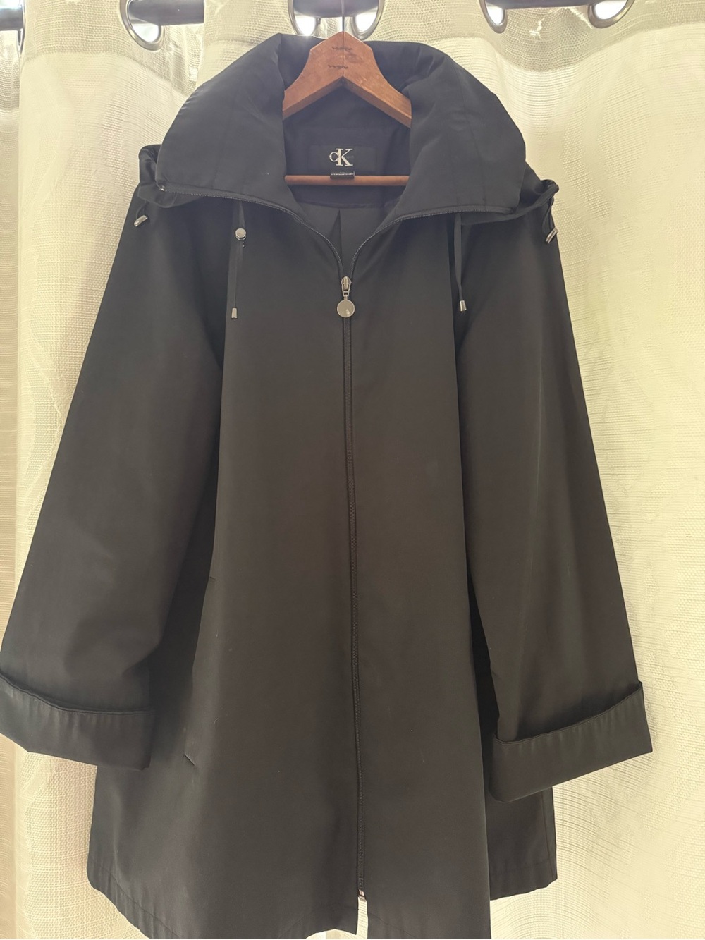 Calvin Klein black women’s rain coat (L)
